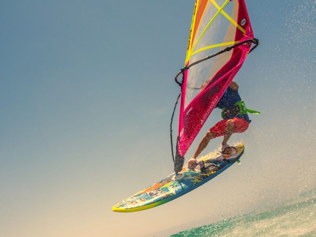 A woman windsurfing